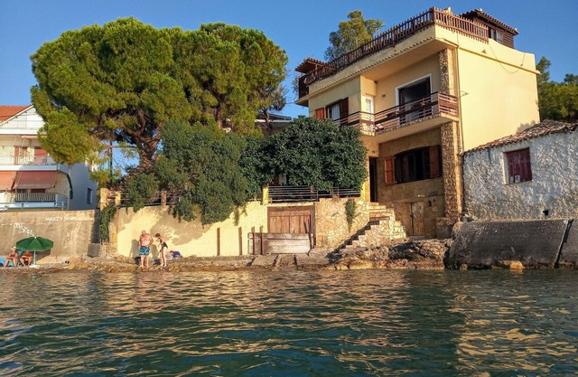 Traditional house over the sea wave