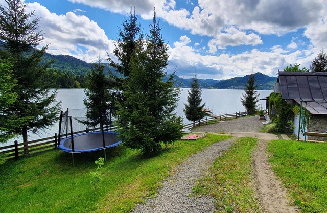 Traditional Fisherman's house Colibita, lakefront with view and pontoon