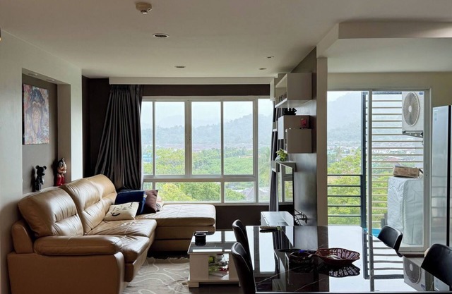 Tranquil 2-bedroom condo with AC and WiFi for a relaxing stay