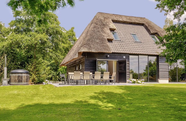 Tranquil Farmhouse in Rijsbergen with Hot Tub and Garden