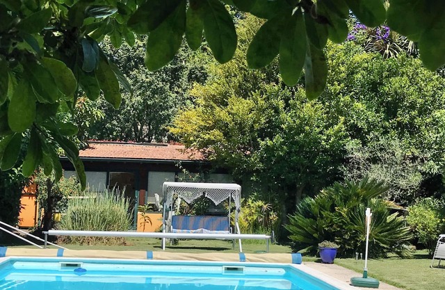 TRANQUILITY IN QUIET GARDEN WITH POOLn(long stays only - prices negotiable)