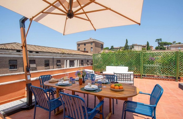 TreasureRome Rooftop Terrace Over Arch of Janus 2BR Duplex