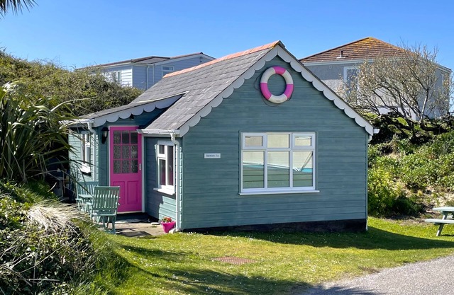 Trewoon is a charming traditional wooden chalet, nestled within the dunes on the Riviere Towans