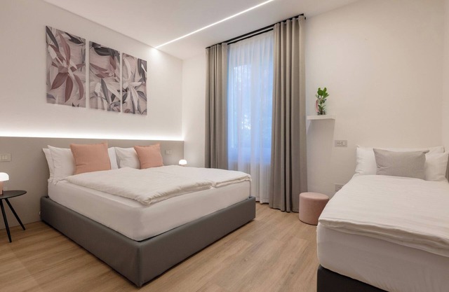Triple room consisting of double bed and single sofa bed