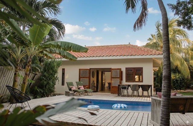 Tropical family villa with private pool. Centrally located 7 min from the beach