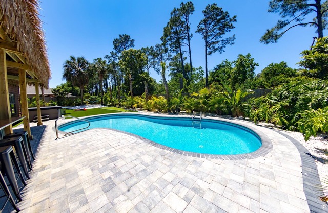 Tropical Oasis, Tiki Bar, HTD Pool, Mini Golf, Hot Tub, Game room, 110" Theater