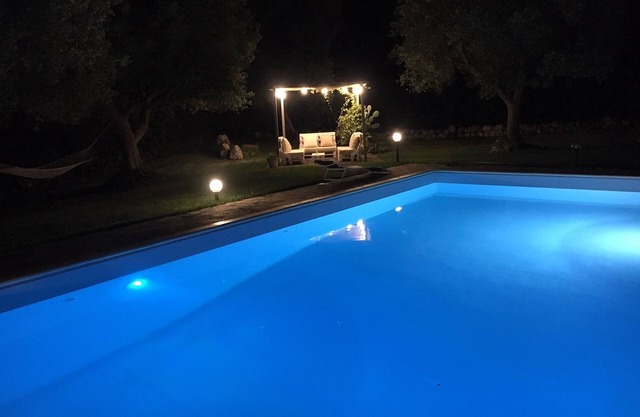 Trullo in the countryside with swimming pool and sea view