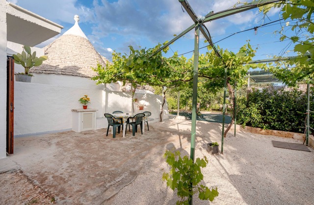 Trullo 'Negli Ulivi' with Private Terrace, Wi-Fi and Air Conditioning