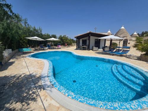 Trullo Olivia con piscina riscaldata, natura e relax