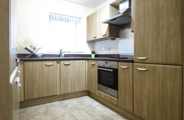 Tudors eSuites Park Central Townhouse Garden and Parking