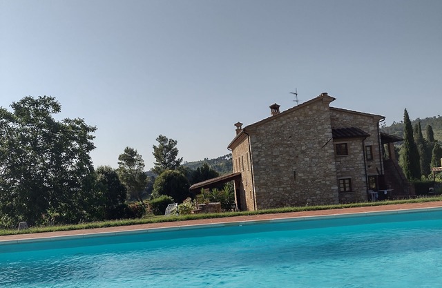 Tuscan-style villa with private pool and 2500 acres of garden and land.