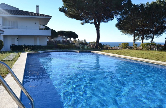 Twin villas with large pool and sea views near Barcelona. Free wifi, a/c
