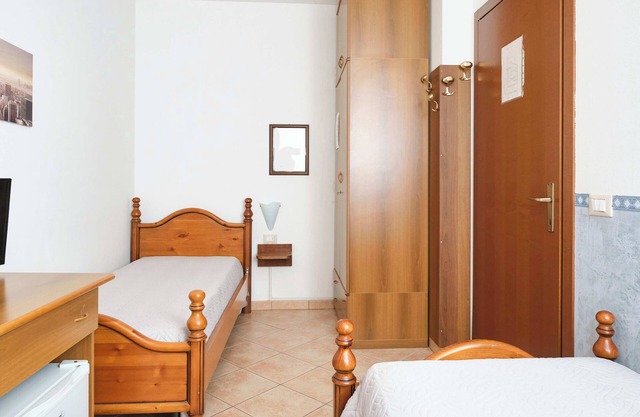 Twin room along the river Po in a B&B in Porto Viro