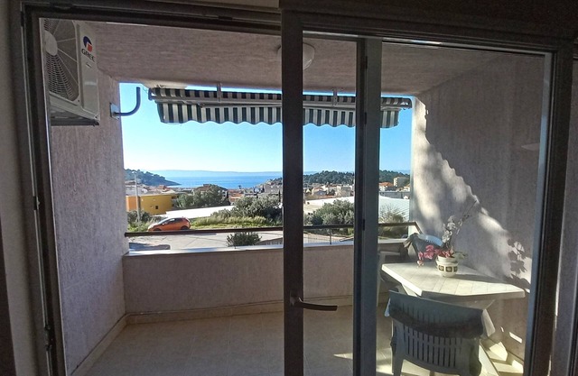 Two bedroom apartment with terrace and sea view Makarska (A-19756-a)