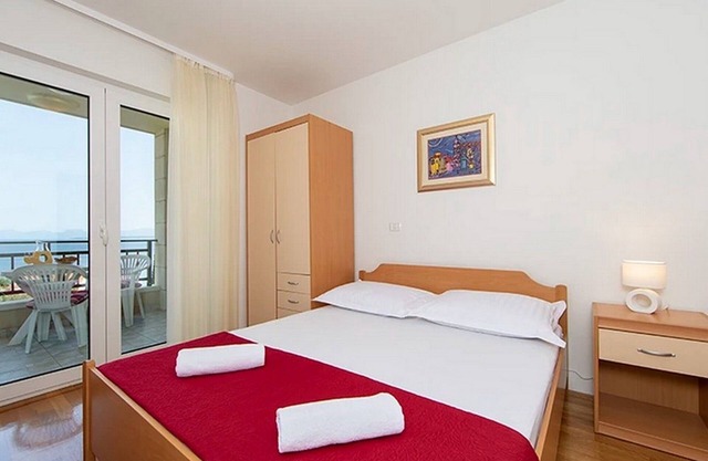 Two bedroom apartment with terrace and sea view Igrane, Makarska (A-17292-a)