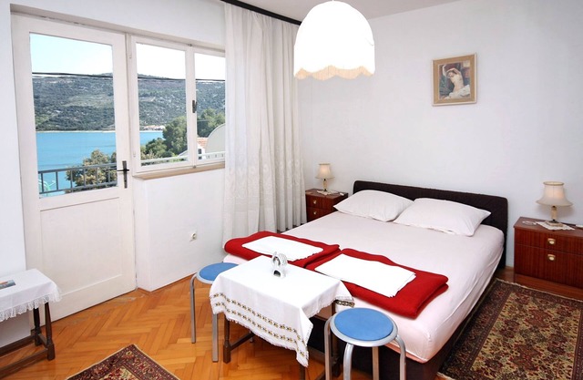 Two bedroom apartment with terrace and sea view Marina, Trogir (A-2791-a)