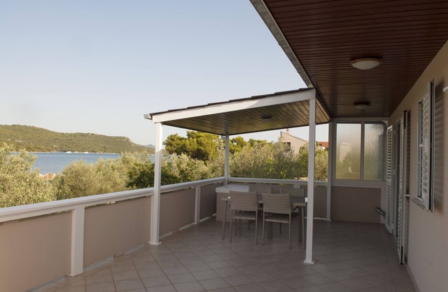 Two bedroom apartment with terrace and sea view Cove Mala Lamjana, Ugljan (A-8449-a)