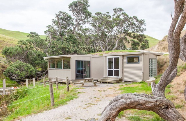 Two-cabin complex at private beach with 3 bedroom house