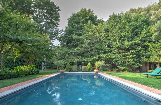 Two Master Suites, Eat-In Kitchen with Breakfast Area, Den with Fireplace,.