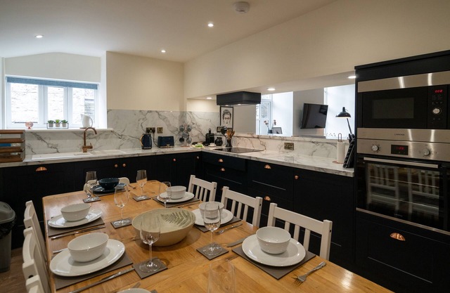 Two separate 2-bedroom apartments, joined by a private hallway. Kendal Town Centre