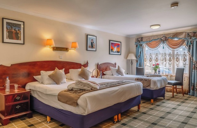 Two Welcoming Rooms | Family Ready, Near Breathtaking Oban Bay & McCaig’s Tower