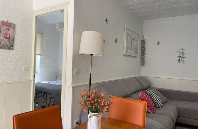 Typical town house on the ground floor, well lit and a large equipped terrace.