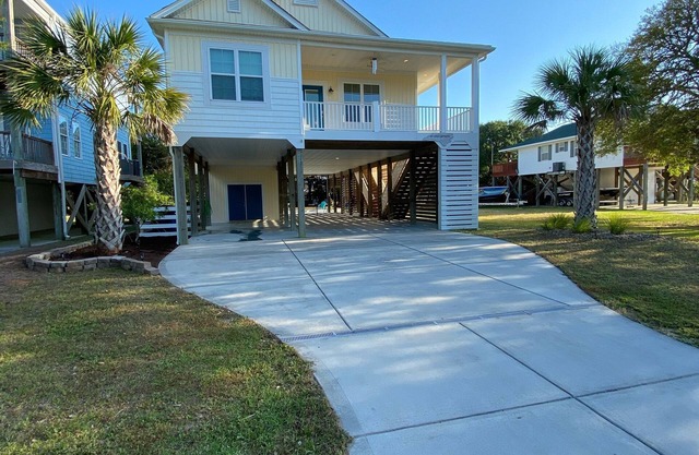 Ultimate Beach Getaway in Beautiful Home with heated pool option!