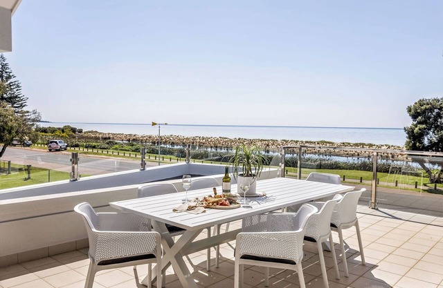 ULTIMATE BEACHFRONT ESCAPE SITUATED OPPOSITE SERENE WATERS OF GEOGRAPHE BAY.