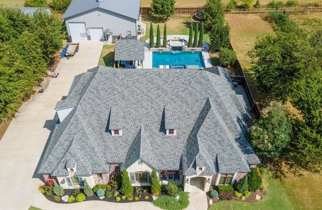 Ultimate Luxury Retreat: House Boasts Hot Tub, Pool, and Easy Airport Access