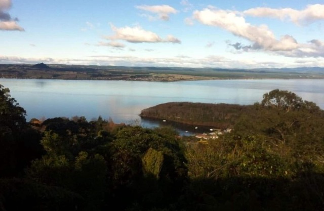 Uninterrupted lake views, sun and privacy. A traditional family friendly home.