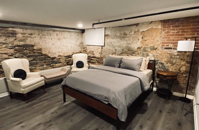 Unique brick basement apartment directly on Adamson Square!