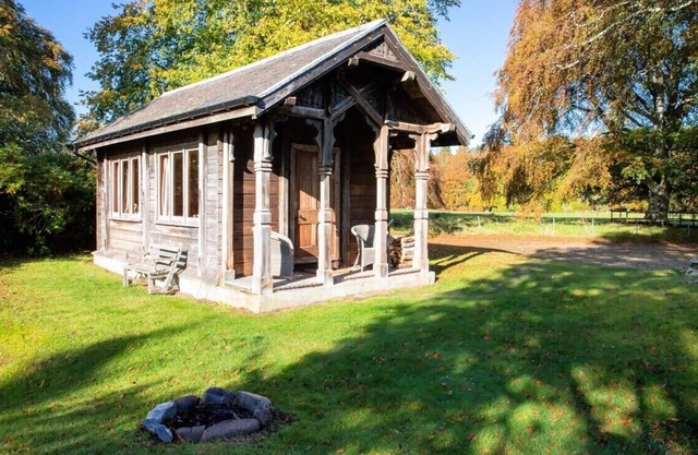 Unique Norwegian cabin perched above the River Findhorn with a stunning view