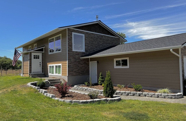 Unique renovated 4 bedroom home on private corner lot