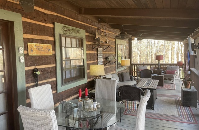 Unique updated waterfront cabin on Lake Sinclair Private dock fire pit hot tub