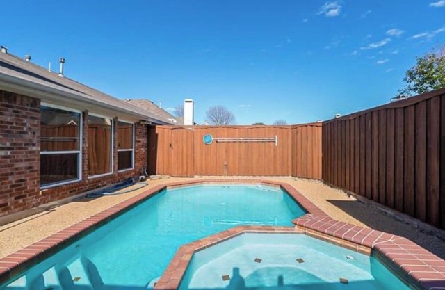 Updated 1 story home in Frisco with a pool and high end furniture!