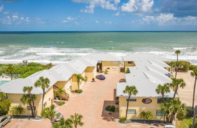 Updated Condo with Beach View 30 steps away from your toes being in the sand!