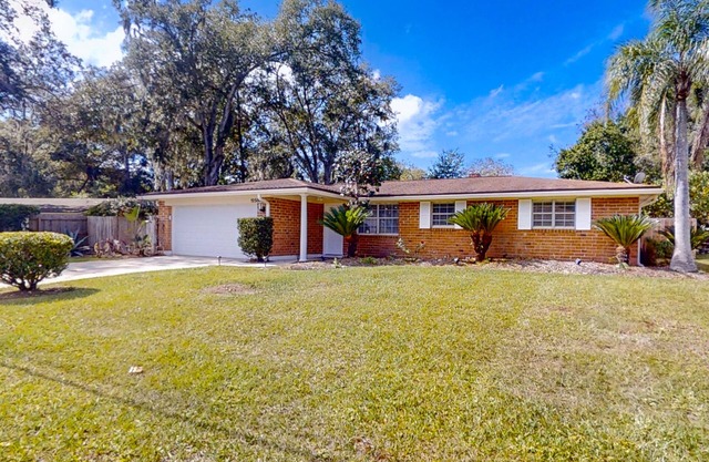Updated dog-friendly home near water with private pool, patio, streaming, AC