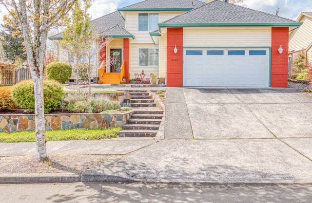 Updated home with pergola, deck, gas grill, WiFi, & landscaped backyard