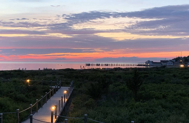 Updated Modern Waterfront condo with private beach, pool, tennis, pier & more.
