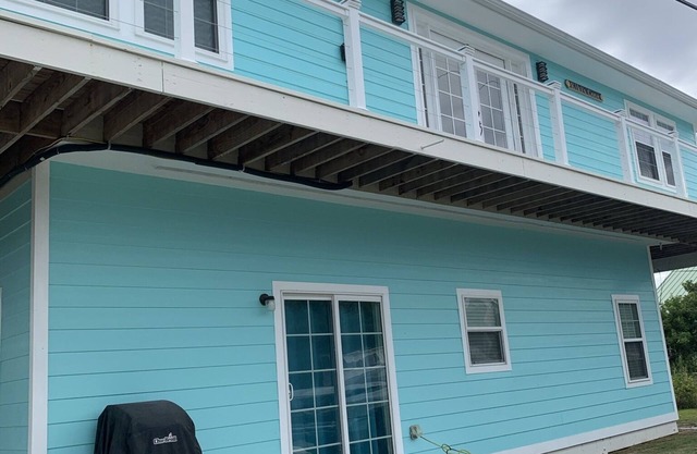 Upstairs 3 BR, 2 bath home, 150 yds from beach with beautiful clear water.