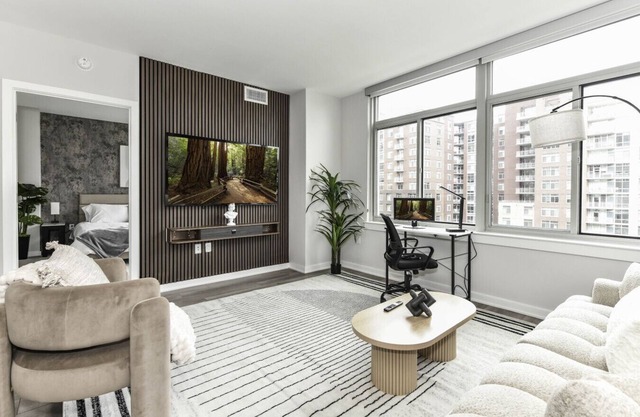 Urban 2BR Oasis with Scenic Rooftop & Gym