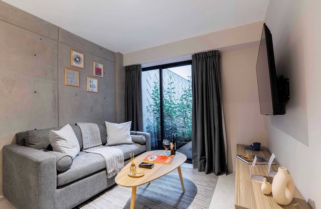 Urban Escape with Private Patio and Premium Decor