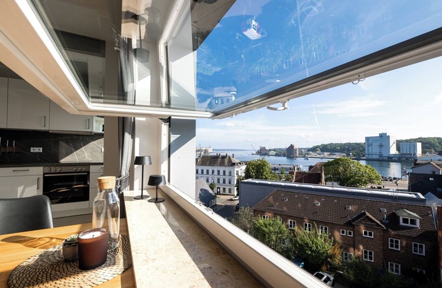 Urban living with fjord view, parking space, water view, WLAN