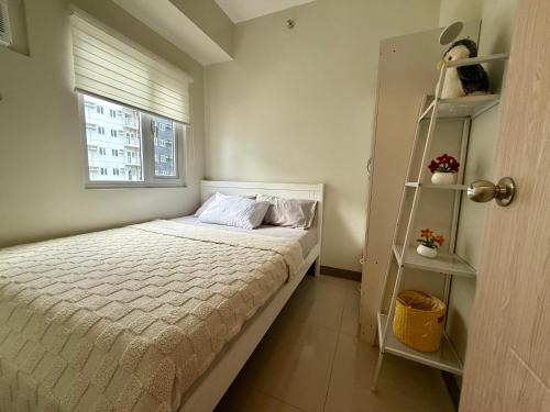 Urban Oasis 2BR Condo with Multiple Pools at SMDC Charm Residences