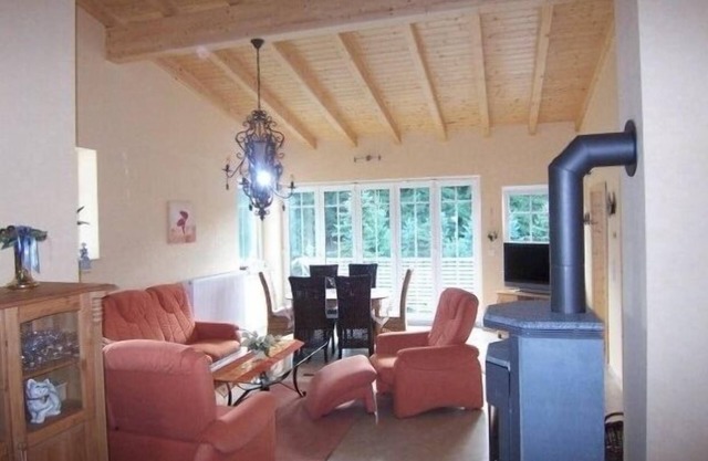 Vacation apartment with natural wood furniture and balcony
