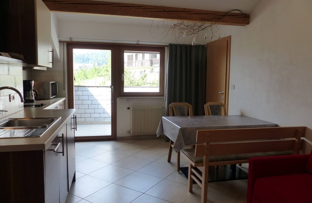 Vacation apartment for 2-4 people with southwest-facing loggia and organic natural bathing pond