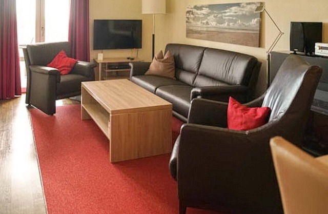 Vacation apartment near the beach with sauna, balcony with beach chair and wonderful view