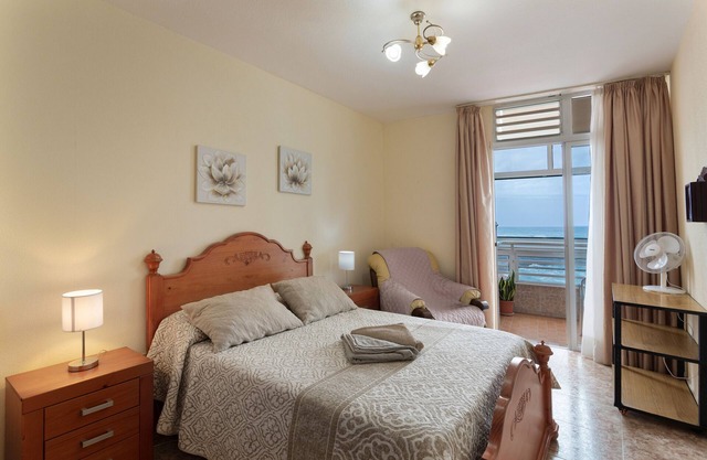Vacation Apartment 'Un Guiño Al Mar' with Sea View, Private Terrace and Wi-Fi