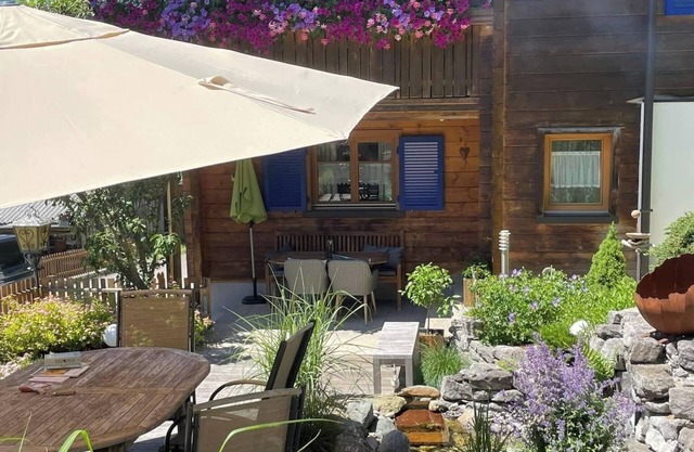 Vacation apartment with the charm of the Montafon. Terrace with a view of the mountains