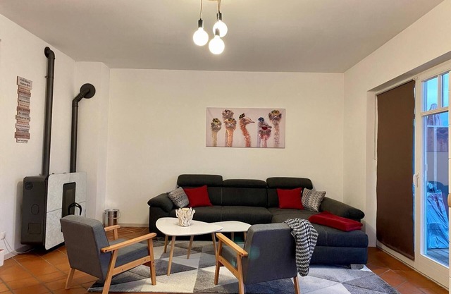 Vacation apartment with south-facing balcony-terrace and open-plan living area